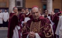 Ralph Fiennes playing Cardinal Thomas Lawerence.