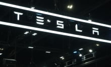tesla name in stylized, light up letters