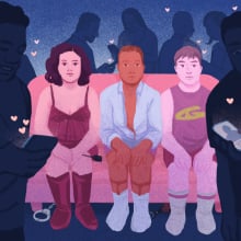 Kinky people sitting on a couch surrounded by people on their phonesÂ
