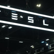 tesla name in stylized, light up letters
