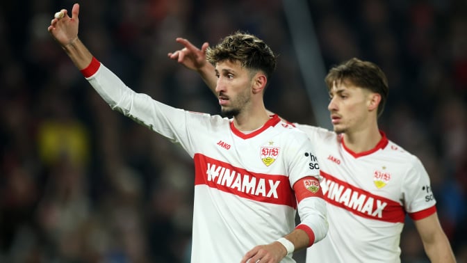 Atakan Karazor and Anthony Rouault of VfB Stuttgart react