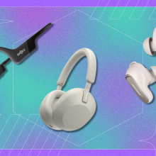 Various headphones in front of a purple and blue background